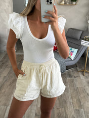 HEART PATTERN CREAM SHORTS