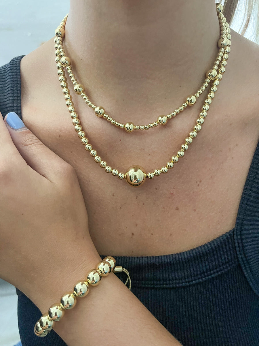 GOLD BALL NECKLACES